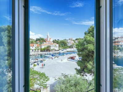 View from the bedroom in Villa Bonaca to Sumartin and its harbor